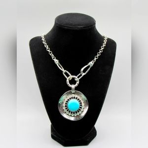Faux turquoise silver toned Fashion Necklace with rhinestones around
